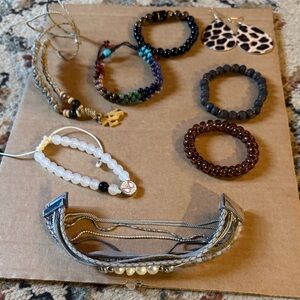 Assortment of great bracelets different colors and leopard print earrings